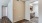 a large room with good lighting leading to other rooms