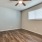 Bedroom with natural lighting and high ceilings