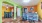 a leasing area with a kitchen and many colorful walls
