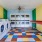 a large community laundry area with a table